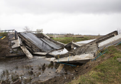 A collapsed bridge over the Trubizh river in Ukraine